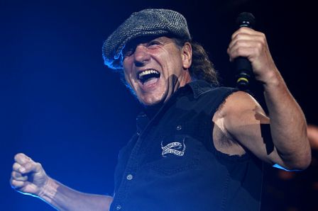 Singer Brian Johnson performs before a strong crowd.