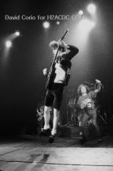 Bon Scott (r) and Angus Young (l) of AC/DC at Hammersmith Odeon, London 